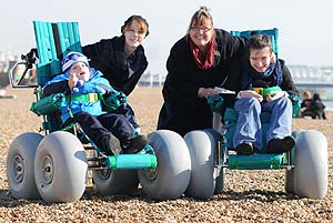 wheelchair users have fun on brighton beach