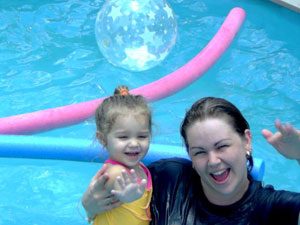 mother and child at swimming pool