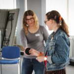 Two young women talking
