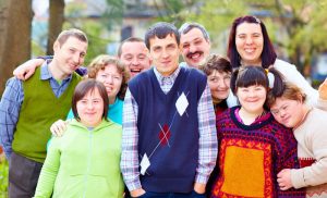 group of happy people with learning disabilities