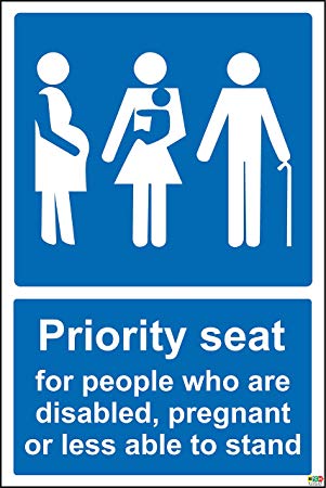 Blue sign saying "priority seat for people who are disabled, pregnant or less able to stand"