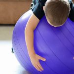 using exercise ball in physio at home
