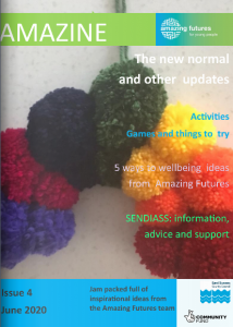 Amazine front cover with image of brightly coloured yarn pompoms