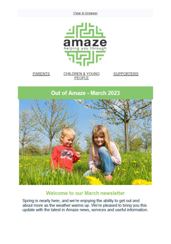 March 2023 Brighton cover featuring photo of children playing in the grass in springtime